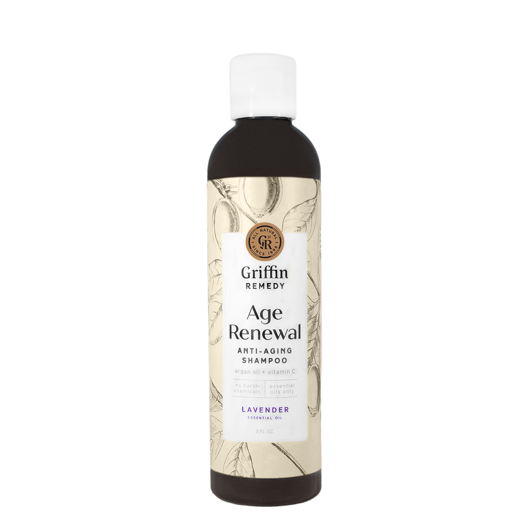 A bottle of Griffin Remedy Age Renewal Anti-Aging Shampoo with a lavender label. Natural hair care.
