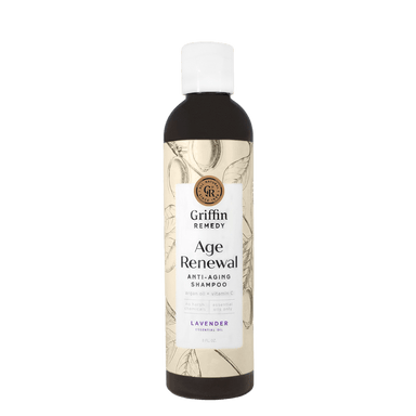 A bottle of Griffin Remedy Age Renewal Anti-Aging Shampoo with a lavender label. Natural hair care.