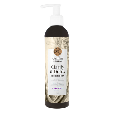 A pump bottle of Griffin Remedy Clarify & Detox Conditioner with a label featuring botanical illustrations and text indicating the product name and scent. Natural hair care.