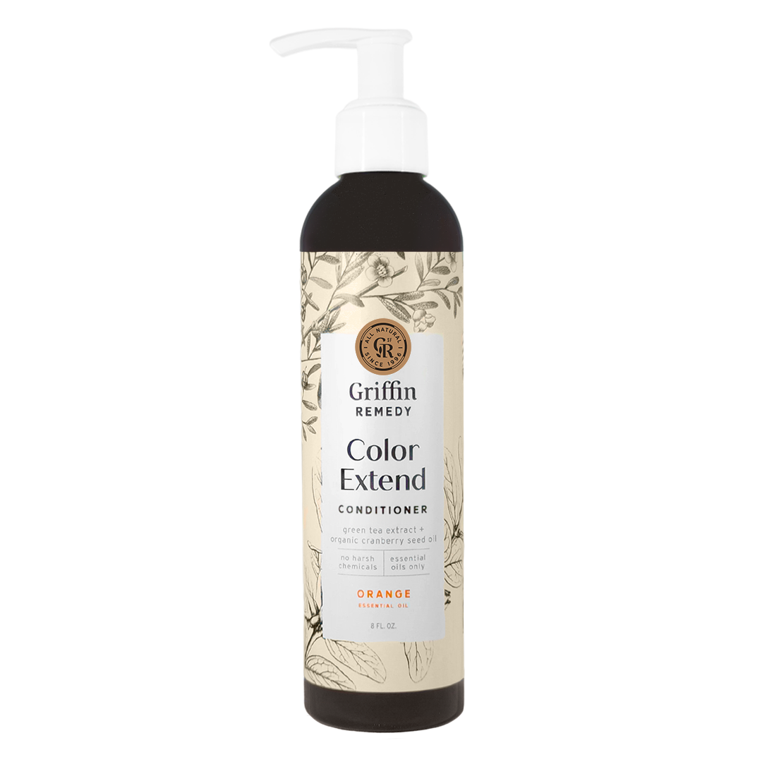 A pump bottle of Griffin Remedy Color Extend Conditioner with a label featuring botanical illustrations. Natural hair care.