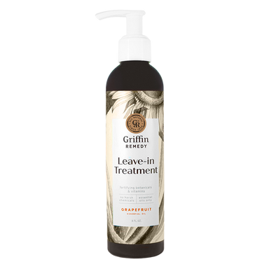A pump bottle of Griffin Remedy Leave-In Treatment with a label featuring botanical designs. Natural hair care.