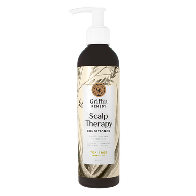 A pump bottle of Griffin Remedy Scalp Therapy Conditioner with Tea Tree scent, featuring a label with botanical illustrations. Natural hair care.