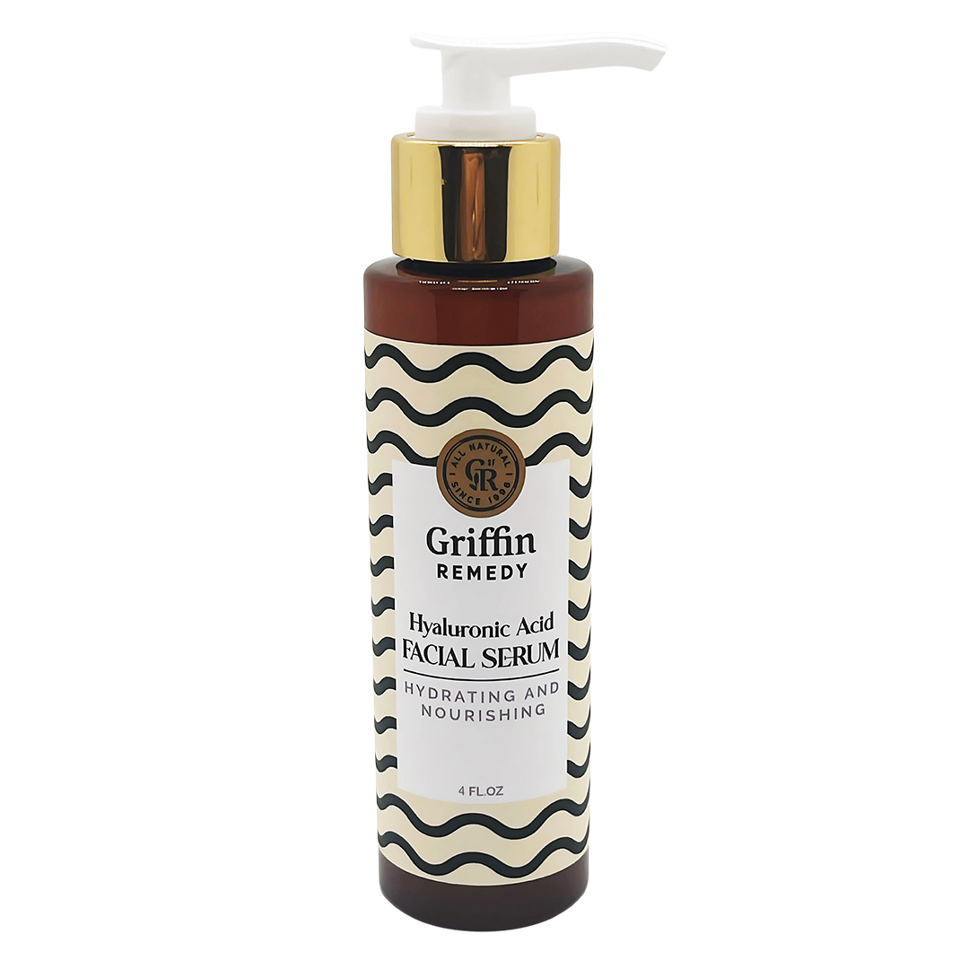 A bottle of Griffin Remedy Hyaluronic Acid Facial Serum with a pump dispenser. The label has a black and white striped design. Natural skincare.