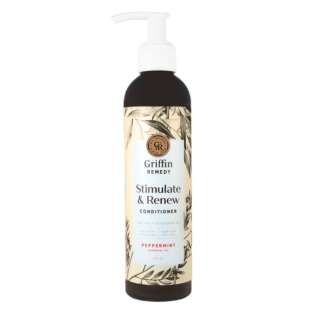 A pump bottle of Griffin Remedy Stimulate & Renew Conditioner with a label featuring botanical illustrations and text indicating the product name and scent. Natural hair care.
