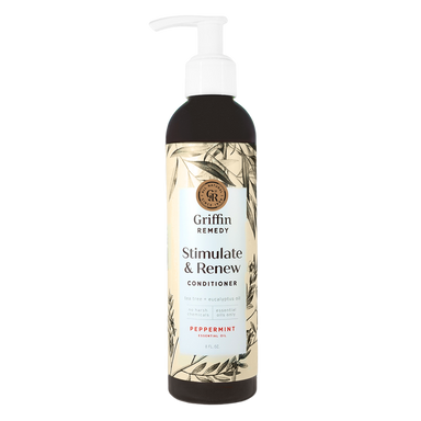 A pump bottle of Griffin Remedy Stimulate & Renew Conditioner with a label featuring botanical illustrations and text indicating the product name and scent. Natural hair care.