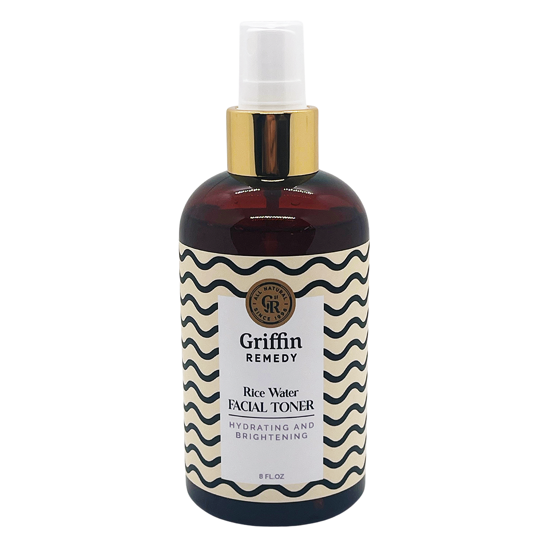 A spray bottle of Griffin Remedy Rice Water Facial Toner with a label featuring a geometric pattern. Natural skincare.