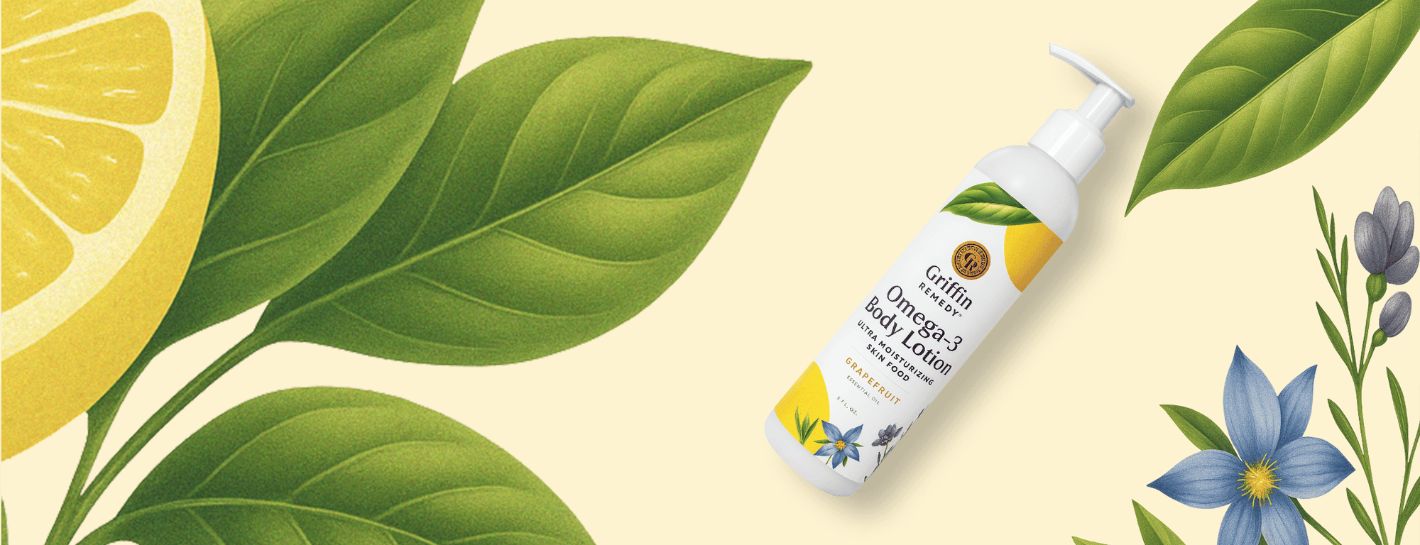 Bottle of organic body cream with lemon and leaf illustrations on a light yellow background
