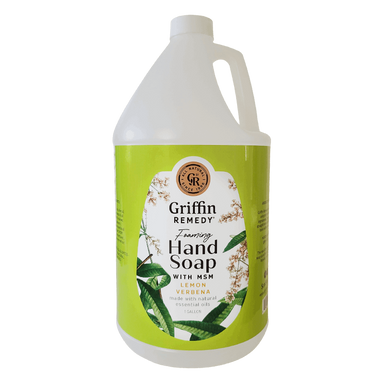 A gallon-sized bottle of Griffin Remedy Foaming Hand Soap with Lemon Verbena fragrance. The label shows the brand name and the scent, with additional mentions of containing MSM and Nature’s Beauty Mineral. Natural soap.