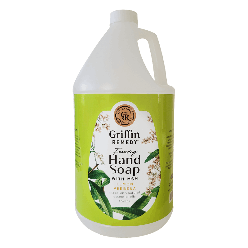 A gallon-sized bottle of Griffin Remedy Foaming Hand Soap with Lemon Verbena fragrance. The label shows the brand name and the scent, with additional mentions of containing MSM and Nature’s Beauty Mineral. Natural soap.
