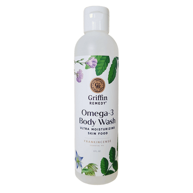 A bottle of Griffin Remedy Omega-3 Creamy Body Wash with a label featuring botanical illustrations and text indicating the product name and type. Natural skincare.