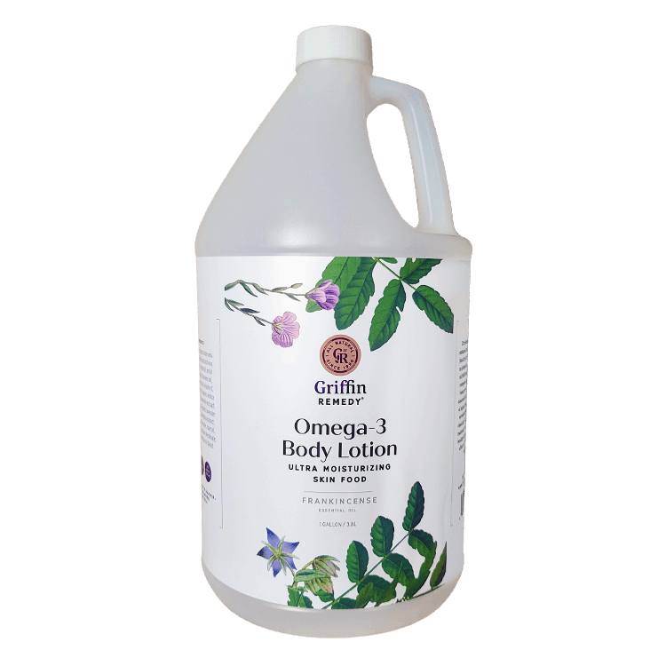 A gallon-sized bottle of Griffin Remedy Omega-3 Body Lotion with a label featuring botanical illustrations. Natural skincare.