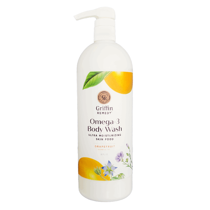 A bottle of Griffin Remedy Omega-3 Creamy Body Wash with a grapefruit scent. The label shows a lemon and leaves design with the product name and an indication of being ultra moisturizing. Natural skincare.