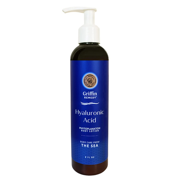 A pump bottle of Griffin Remedy Hyaluronic Acid body lotion with a blue label and dark liquid visible through the bottle. Natural skincare.