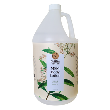 A gallon-sized bottle of Griffin Remedy MSM Body Lotion with Lemon Verbena fragrance. The bottle is white with a handle and a label featuring botanical illustrations. Natural skincare.