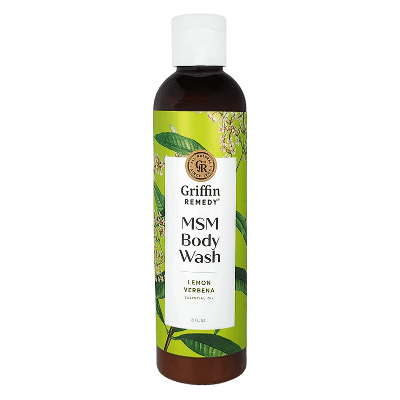 A bottle of Griffin Remedy MSM Body Wash with Lemon Verbena scent. The label shows the product name and an image of lemon verbena plants. Natural skincare.
