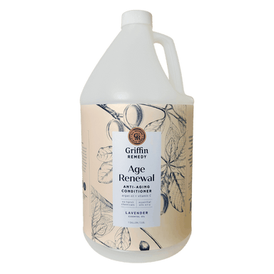A gallon-sized bottle of Griffin Remedy Age Renewal Anti-Aging Conditioner with lavender essential oil listed as an ingredient. Natural hair care.
