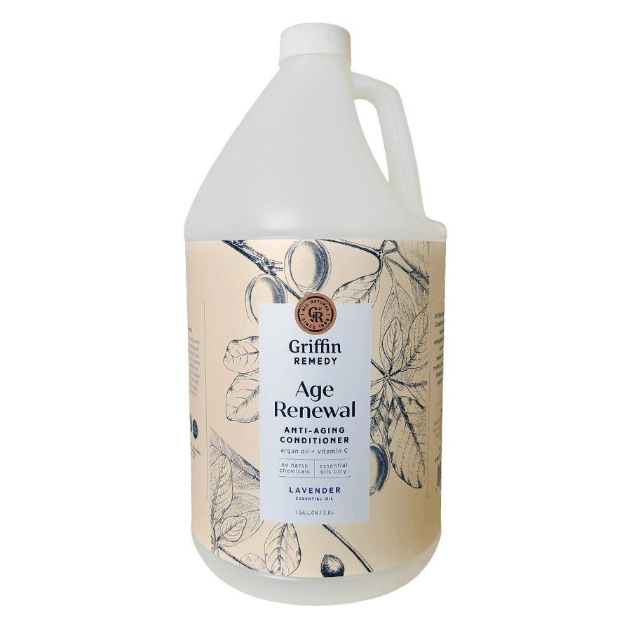 A gallon-sized bottle of Griffin Remedy Age Renewal Anti-Aging Conditioner with lavender essential oil listed as an ingredient. Natural hair care.