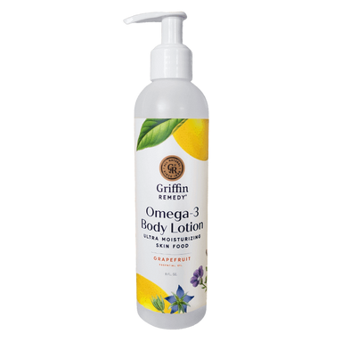 A pump bottle of Griffin Remedy Omega-3 Body Lotion with grapefruit body lotion. The label includes a image of a grapefruit and other botanicals. Natural skincare.