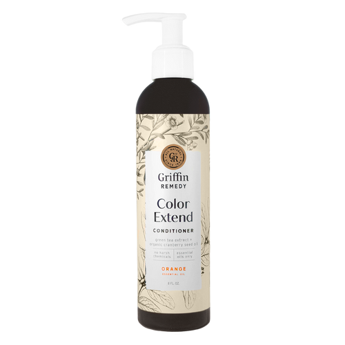 A pump bottle of Griffin Remedy Color Extend Conditioner with a label featuring botanical illustrations. Natural hair care.