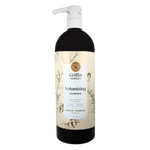 A bottle of Griffin Remedy Volumizing Shampoo with a label featuring botanical illustrations and text indicating the product name and scent, Lemon Verbena. Natural hair care.
