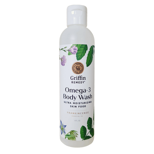 A bottle of Griffin Remedy Omega-3 Creamy Body Wash with a label featuring botanical illustrations and text indicating the product name and type. Natural skincare.